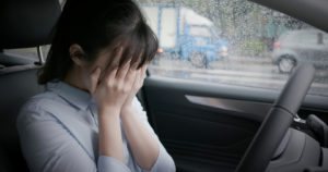 bullied victim sad cry in the car